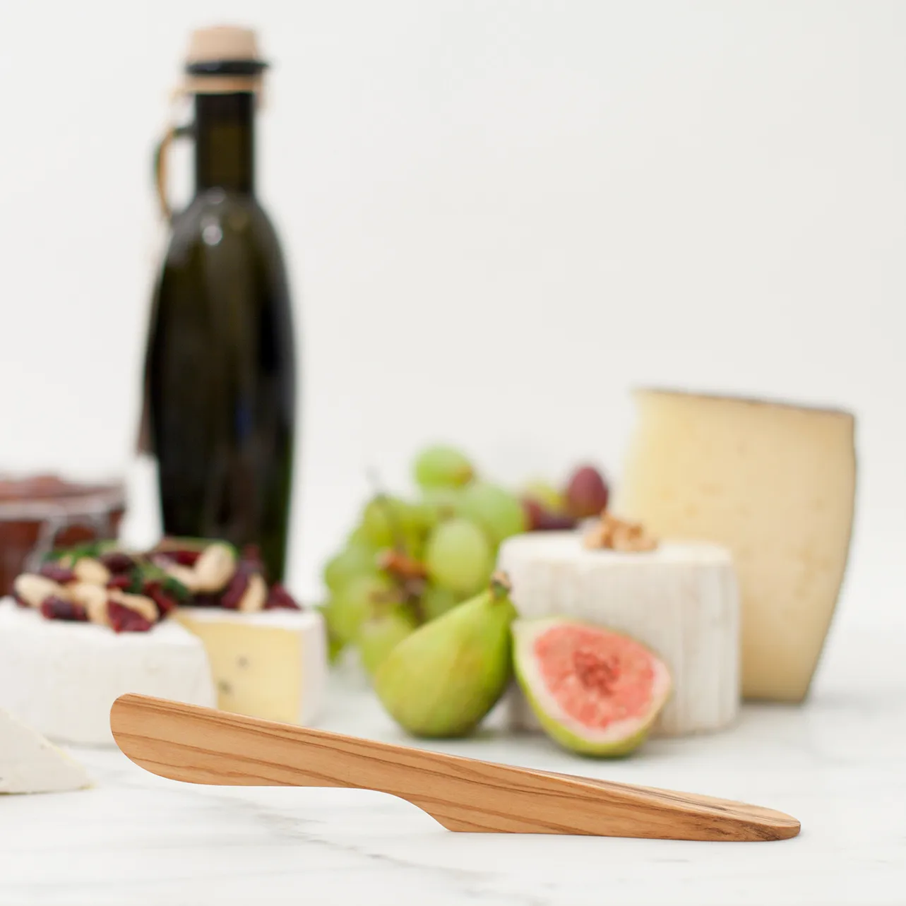 Samodzielnie stojący nóż do masła duży drewno, Drewno oliwne Bosign