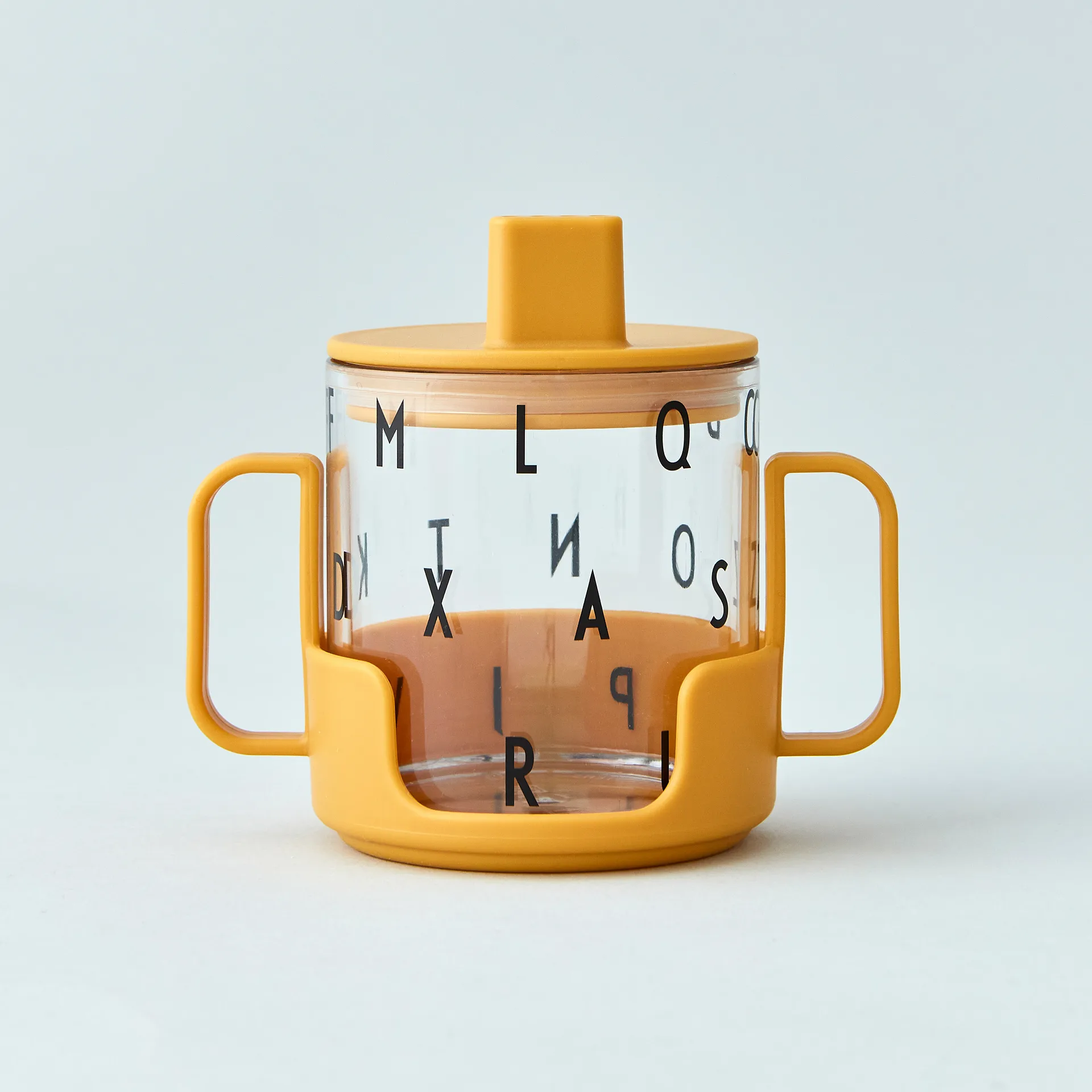 Design Letters uchwyt do szklanki tritan, Mustard Design Letters