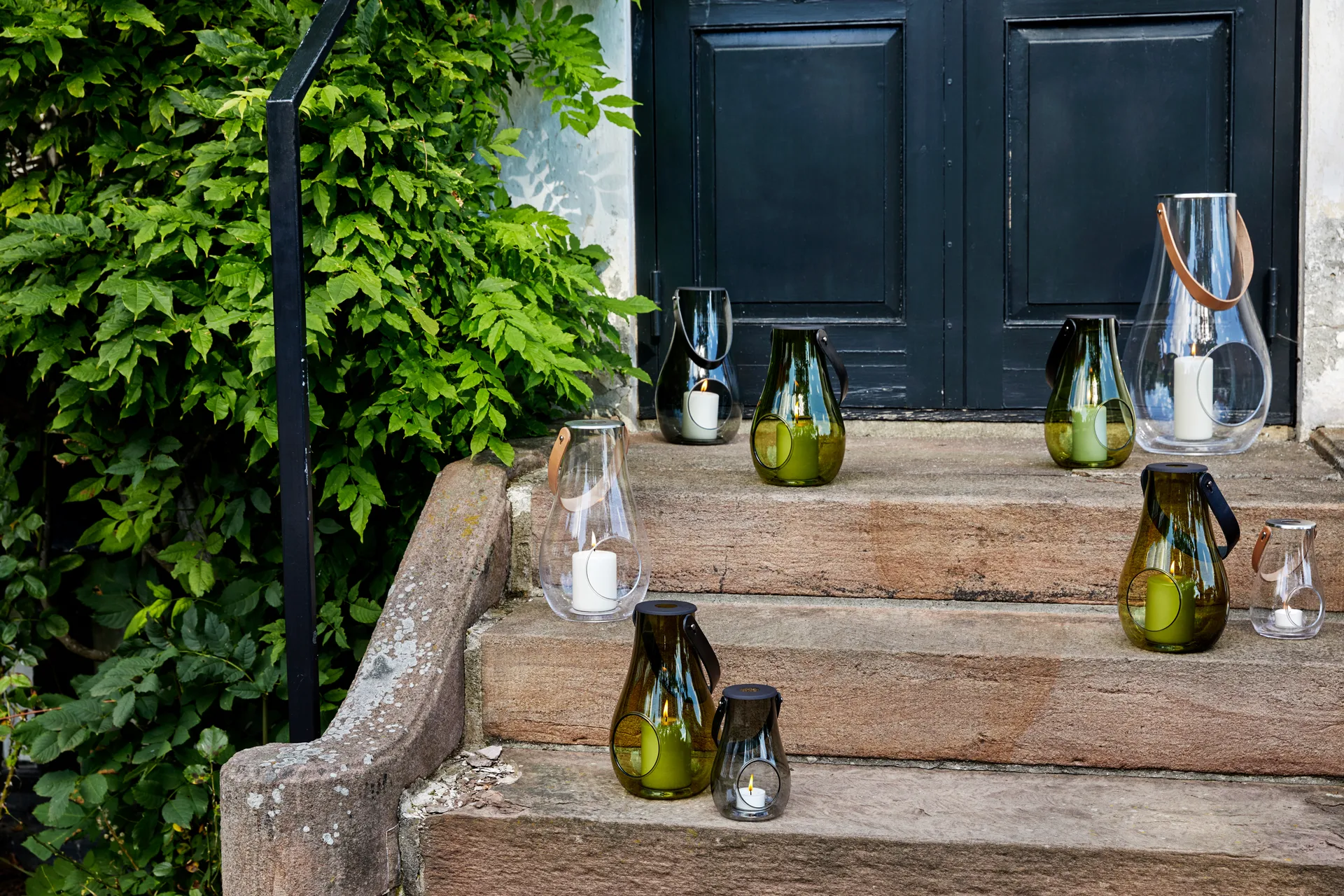 Design With Light lampion świecowy oliwkowa zieleń, 25 cm Holmegaard