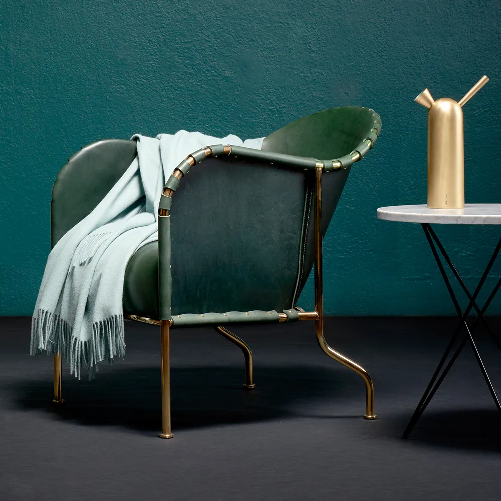 Fotel Bruno, Skóra pełnoziarnista butelkowa zieleń – stelaż mosiężny Källemo