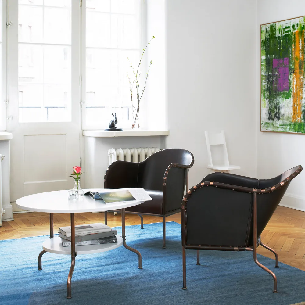 Fotel Bruno, Skóra pełnoziarnista naturalna – stelaż mosiężny Källemo