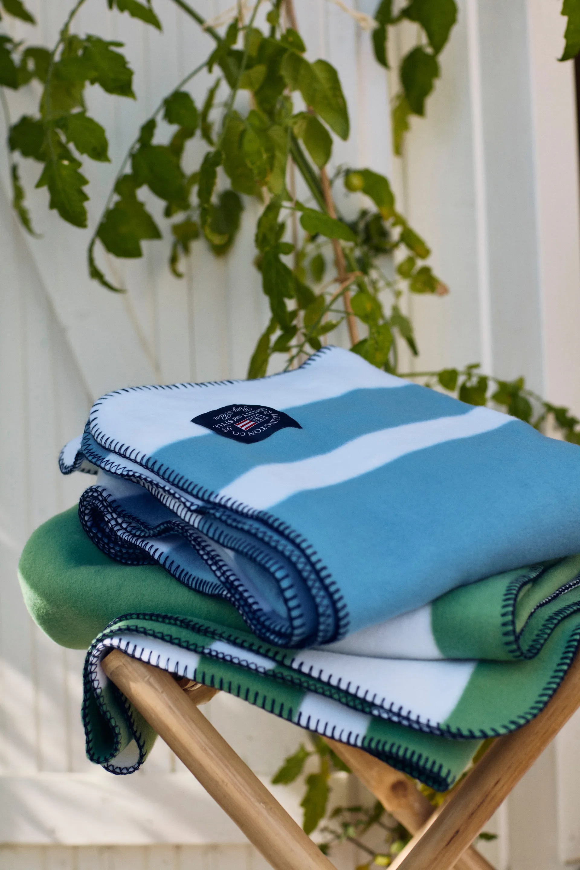 Koc polarowy w nieregularne paski 130x170 cm, Green-White Lexington