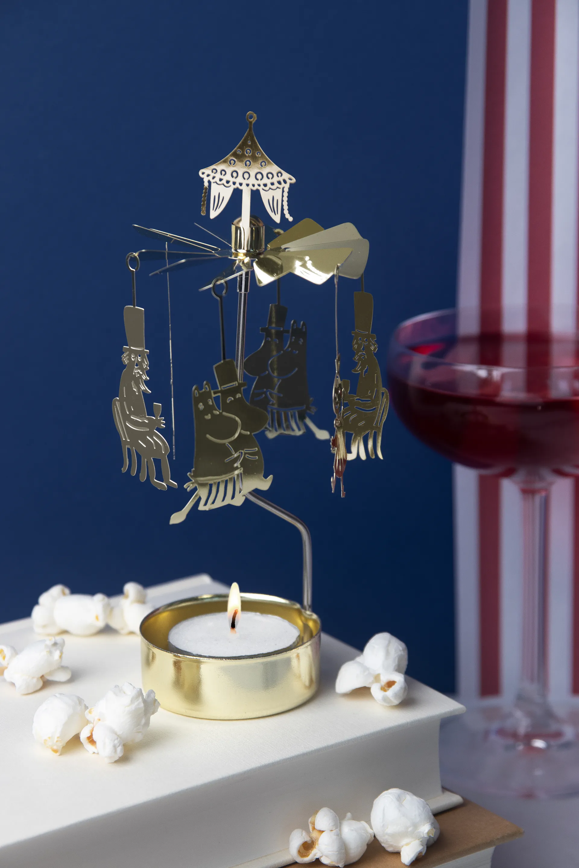 Muminki Party świecznik-karuzela, Złoty-metal Pluto Design