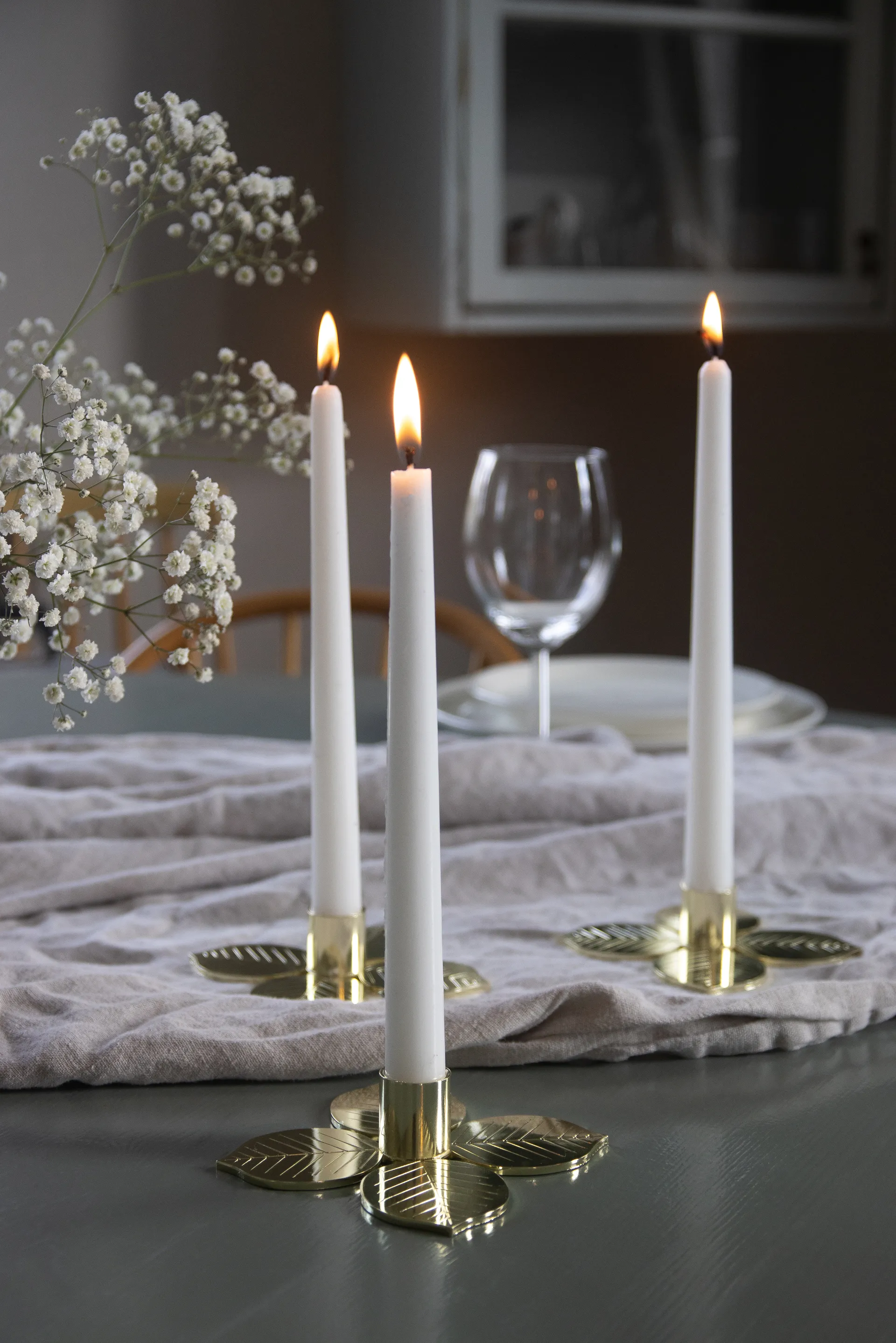 Stig L Berså świecznik, Złoty Pluto Design