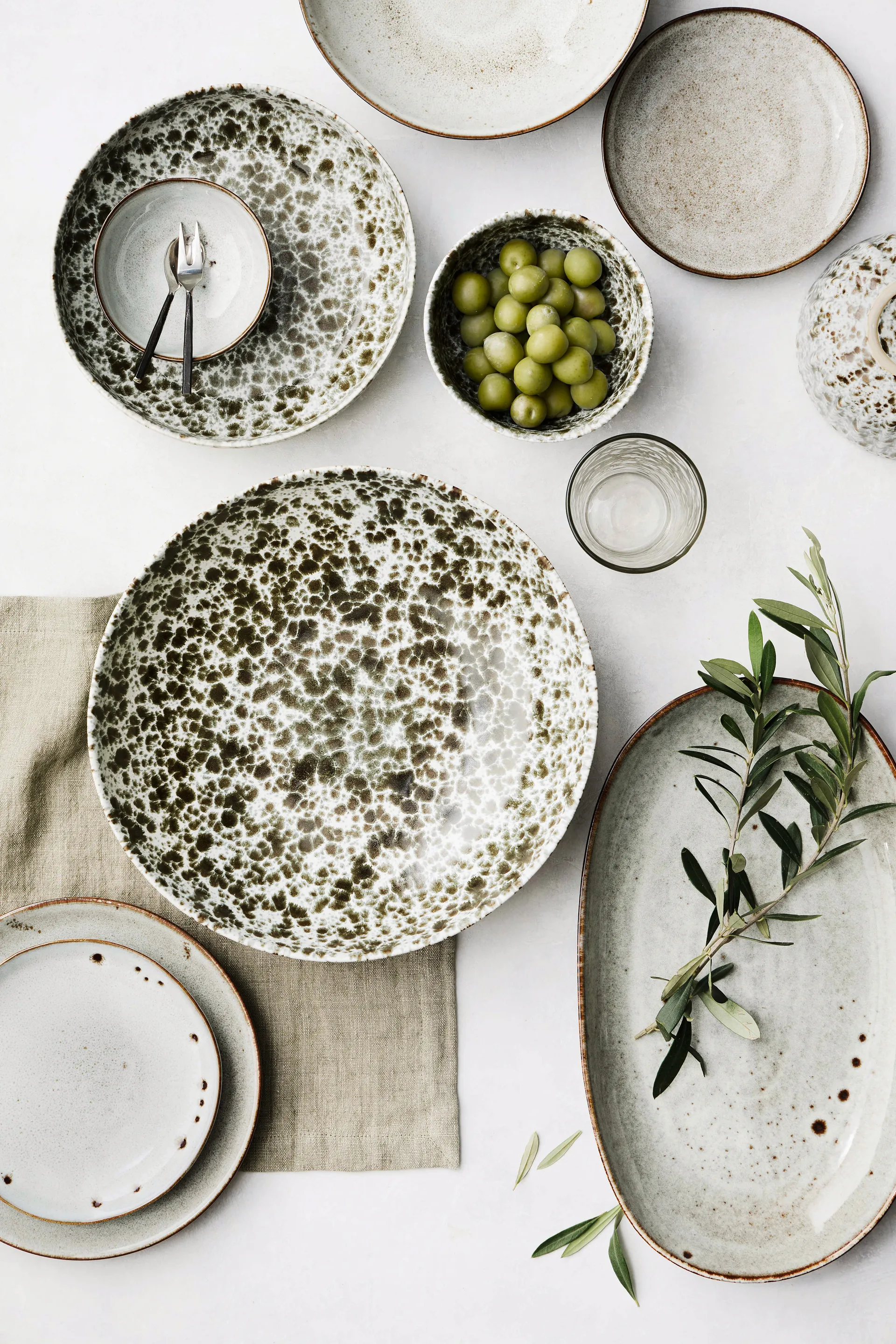 Miska Rivoli small Ø14 cm, Green splatter Tell Me More